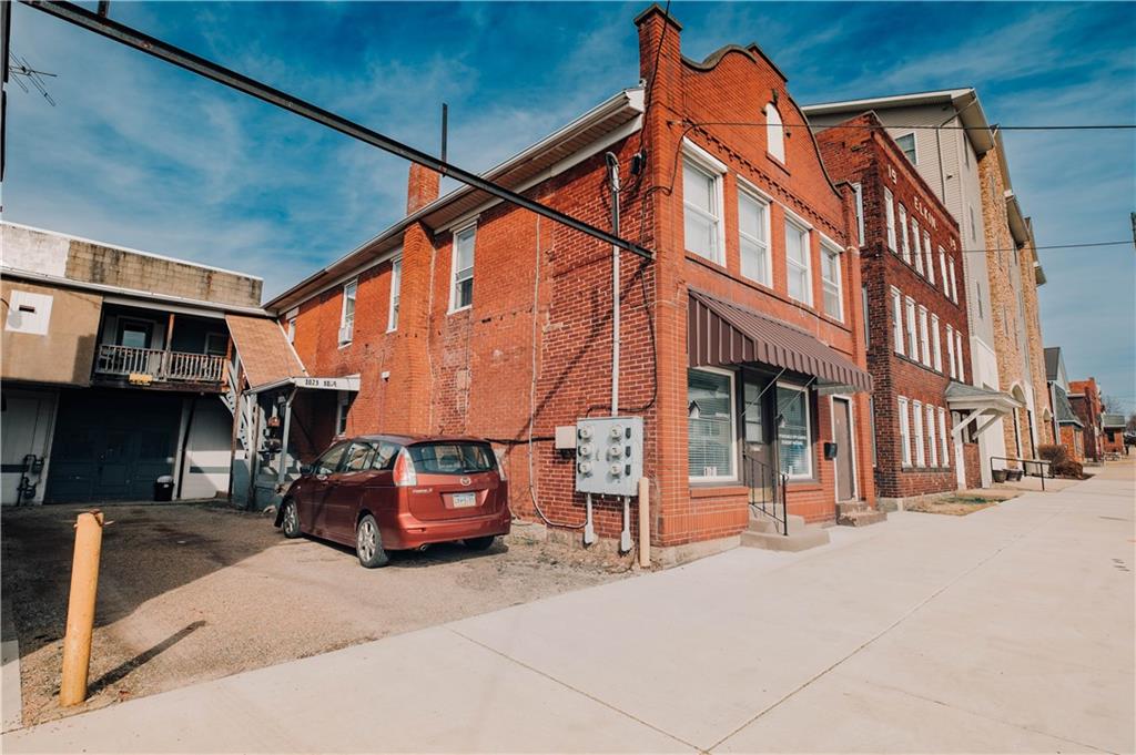 1071-1075 Philadelphia Street Indiana, PA 15701 - Photo 3 of 21 a car parked in front of a building