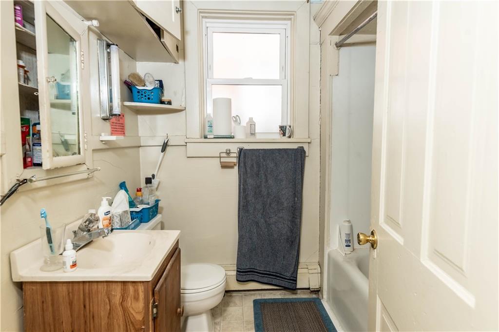1071-1075 Philadelphia Street Indiana, PA 15701 - Photo 9 of 21 a bathroom with a sink toilet and shower