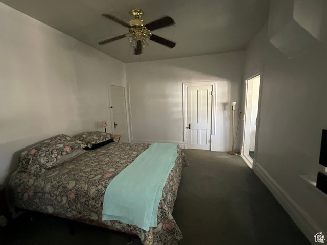 495 North Main Street Beaver, UT 84713 - Photo 3 of 18 Bedroom featuring carpet floors, ceiling fan, and a closet