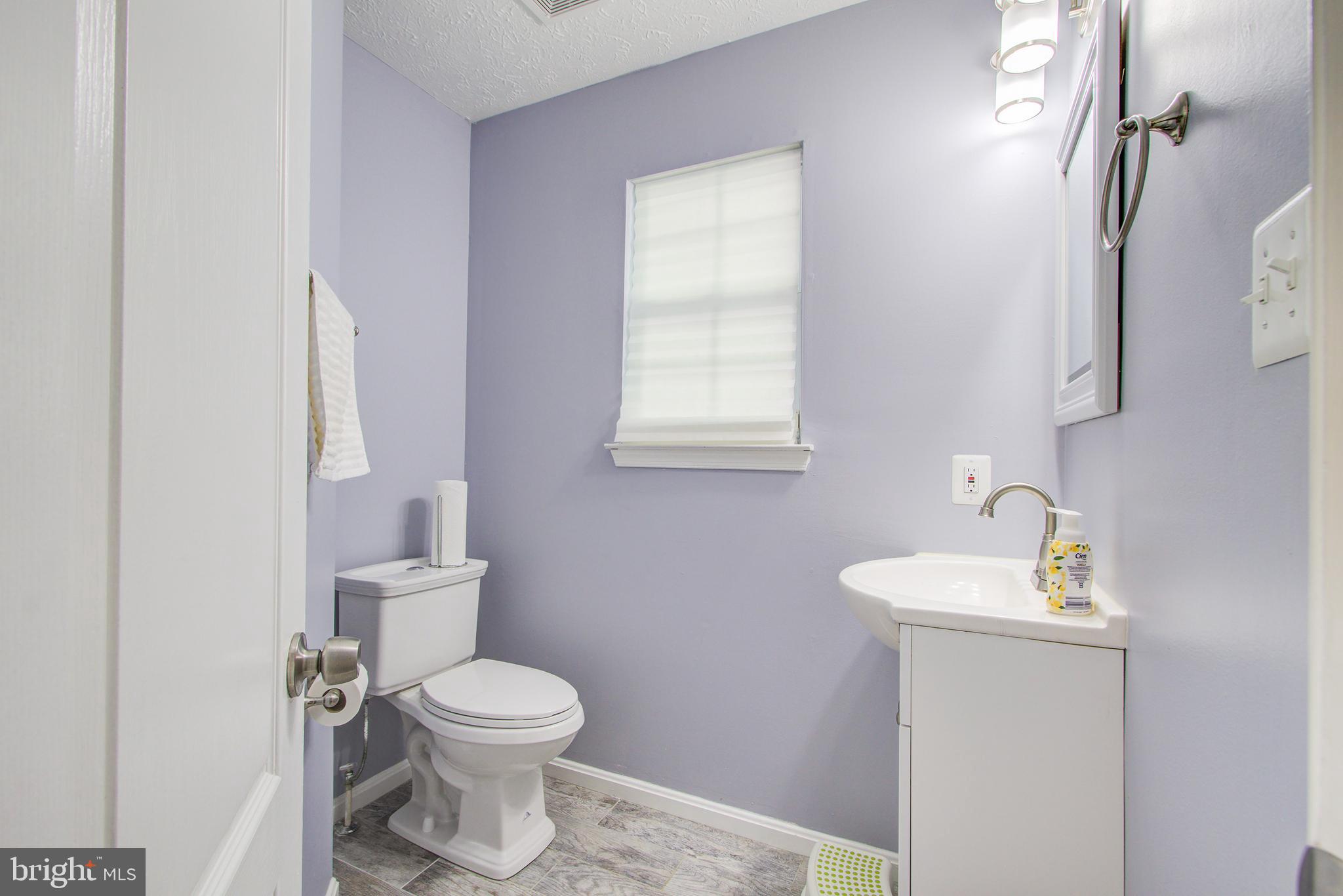 3111 Needleleaf Lane Springdale, MD 20721 - Photo 11 of 47 1st floor Powder room