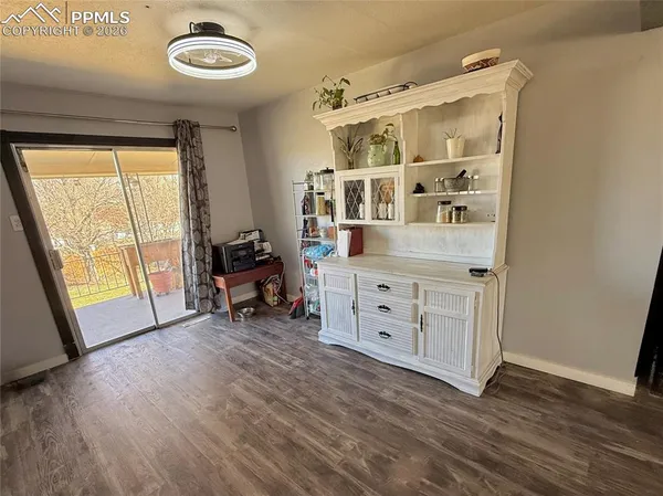a room with furniture and a large window