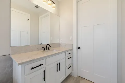 a view of an empty walk in closet