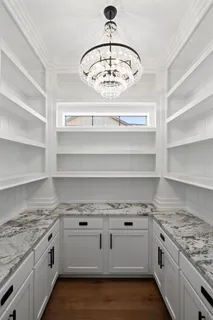 a view of a water heater and a fireplace