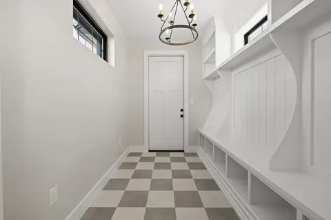 a front view of a house with swimming pool having outdoor seating