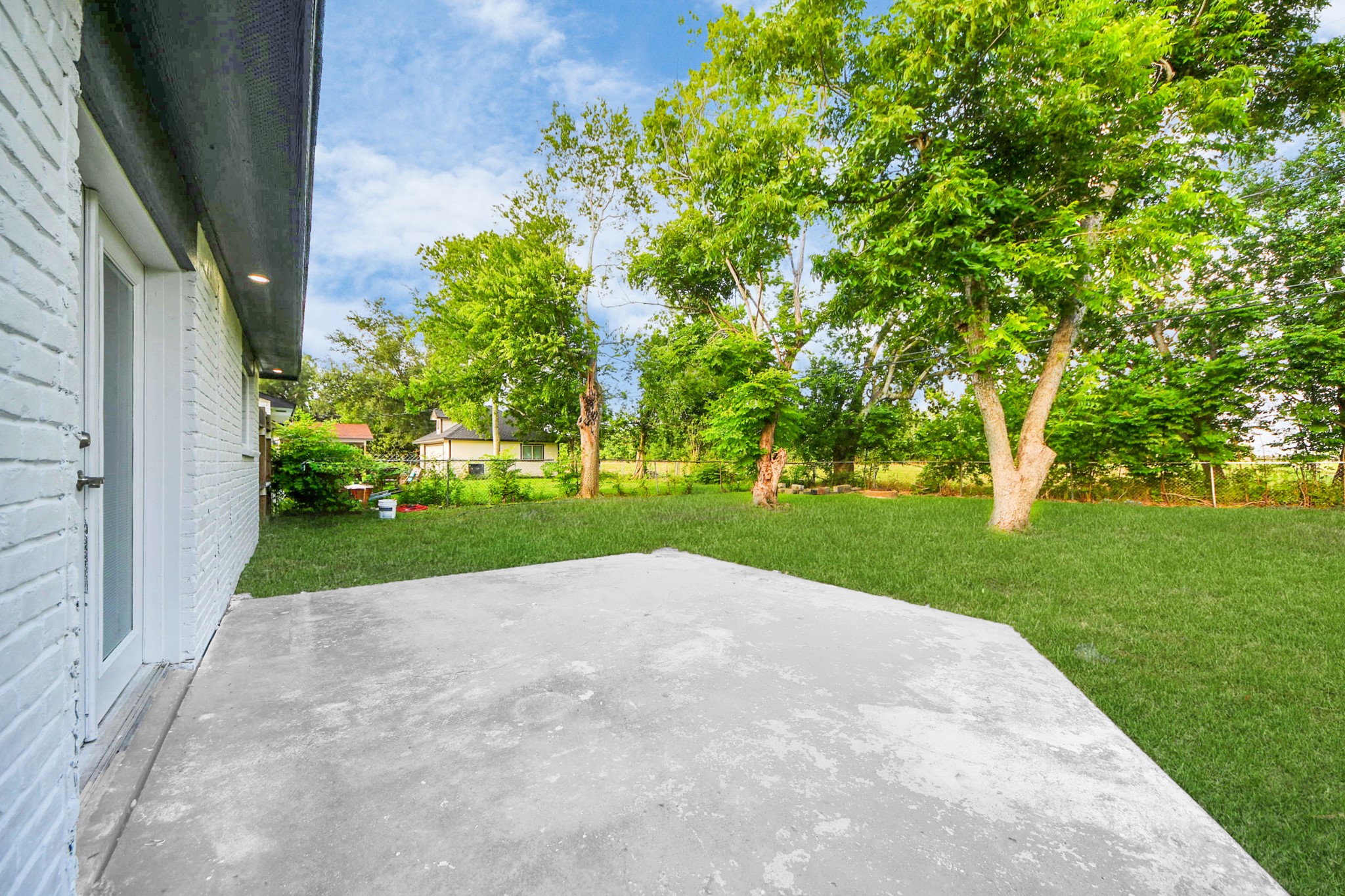 15318 Corsair Road Houston, TX 77053 - Photo 18 of 23 a view of a house with a big yard