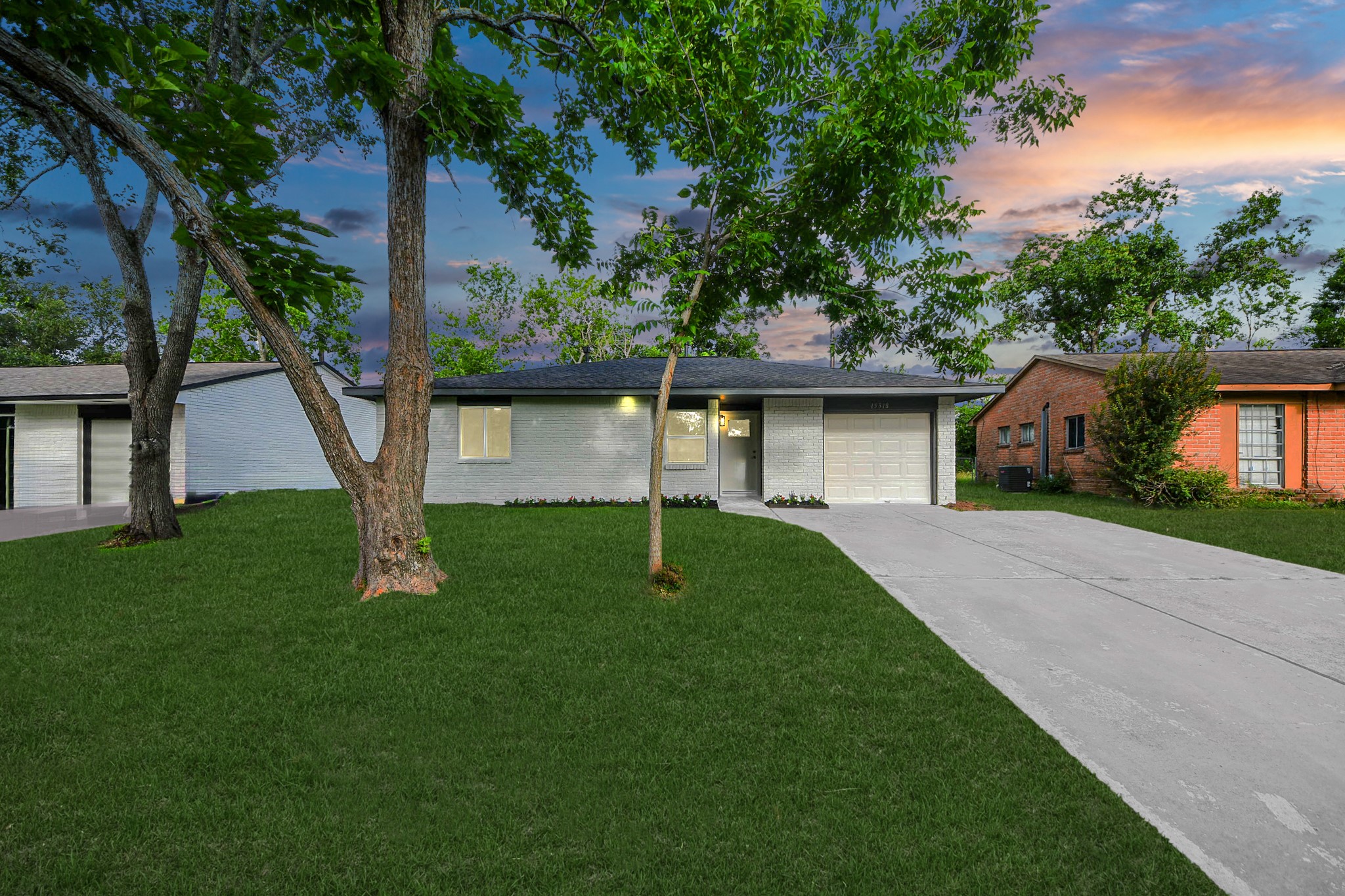 15318 Corsair Road Houston, TX 77053 - Photo 19 of 23 front view of a house with a yard
