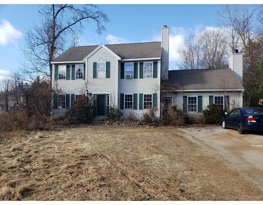 100 Haggerty Road Charlton, MA 01507 - Photo 1 of 22 a front view of a house with a yard