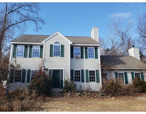 100 Haggerty Road Charlton, MA 01507 - Photo 3 of 22 a front view of a house with garden