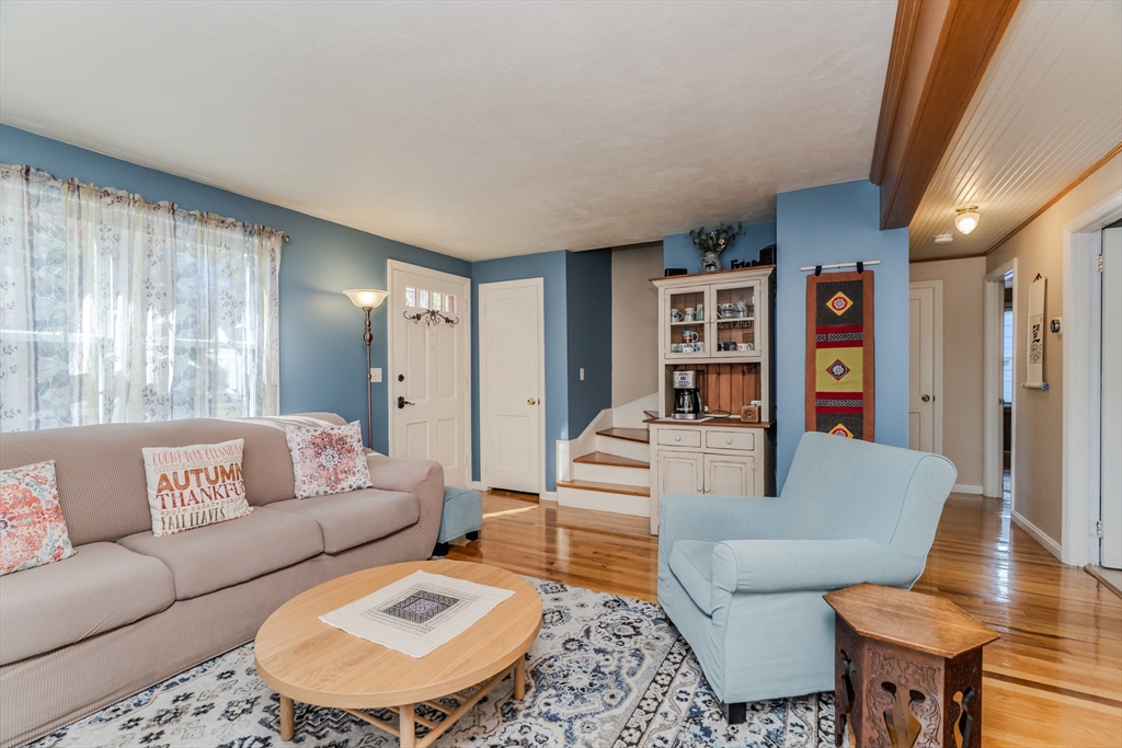 57 Lumae Street Springfield, MA 01119 - Photo 13 of 36 a living room with furniture and a table