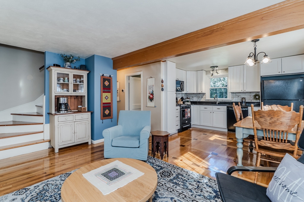 57 Lumae Street Springfield, MA 01119 - Photo 15 of 36 a living room with furniture and a table