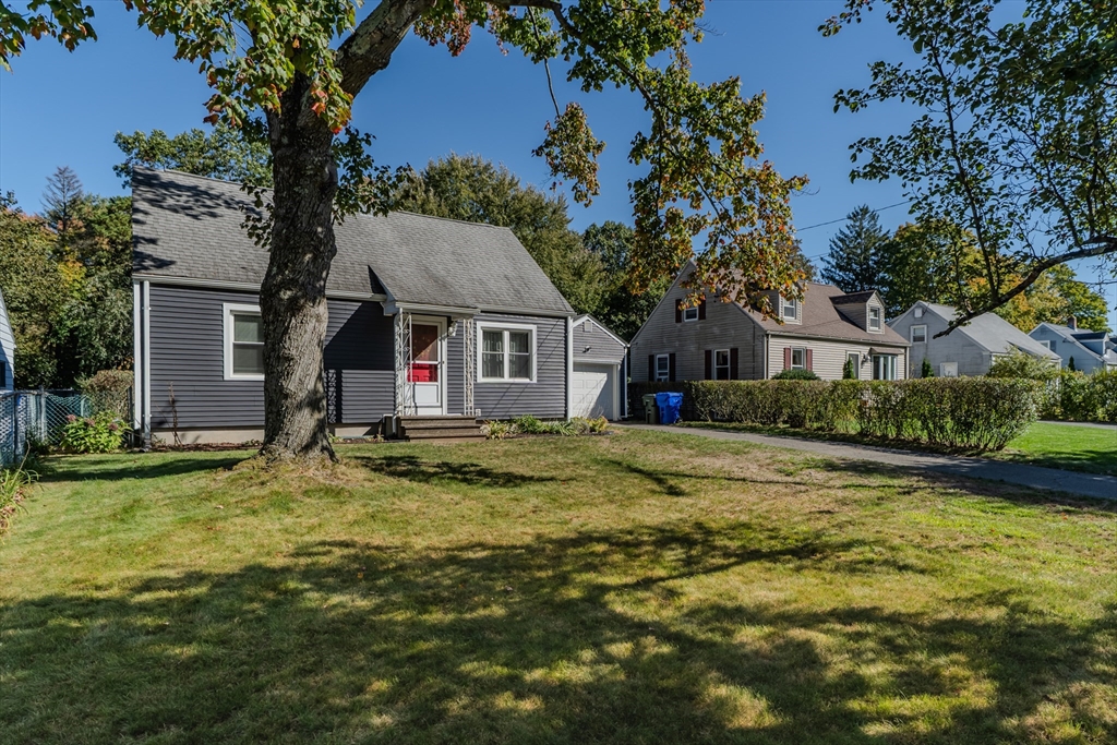 57 Lumae Street Springfield, MA 01119 - Photo 2 of 36 a view of pool of water with yard and trees in the background
