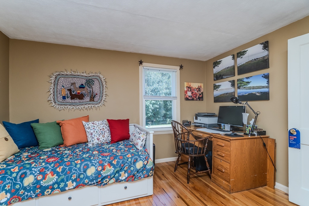 57 Lumae Street Springfield, MA 01119 - Photo 24 of 36 a bedroom with a bed and a desk in it