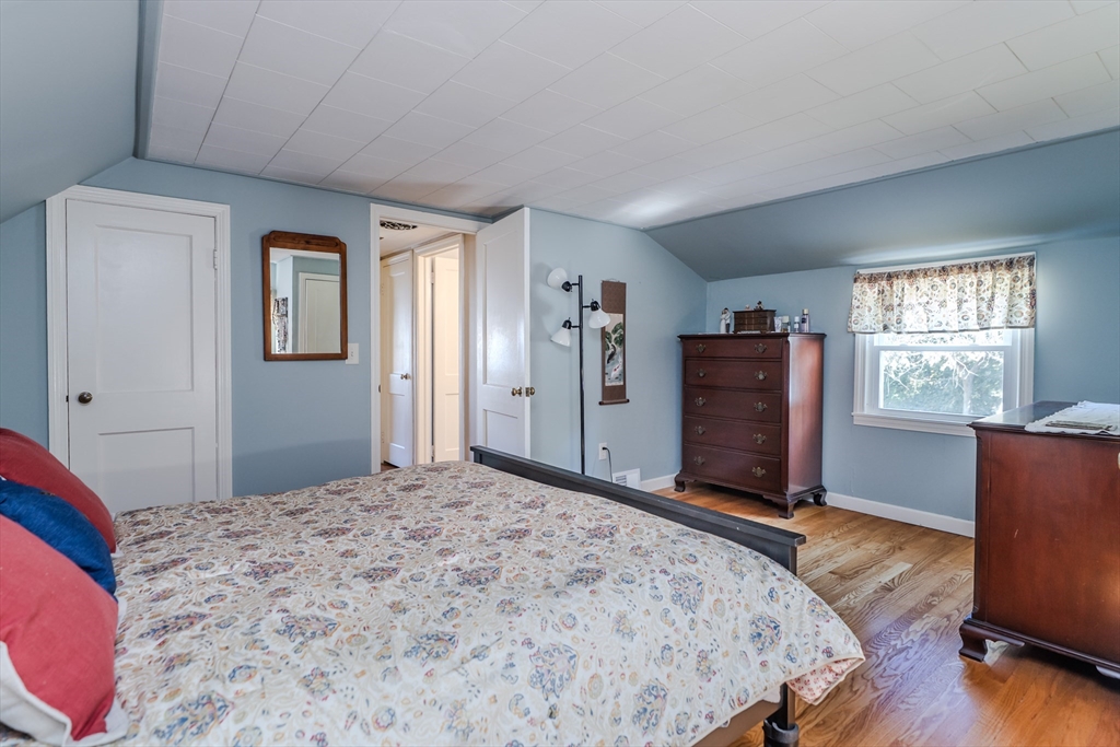 57 Lumae Street Springfield, MA 01119 - Photo 29 of 36 a bedroom with a bed and a window