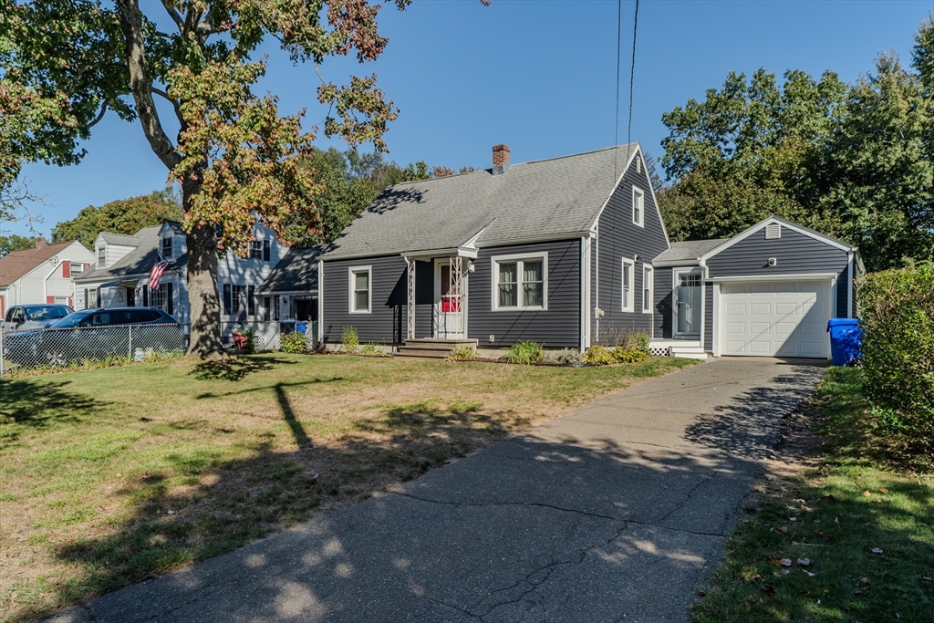 57 Lumae Street Springfield, MA 01119 - Photo 3 of 36 a house view with a swimming pool