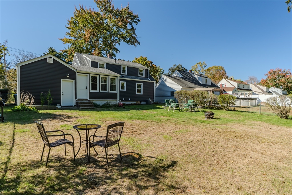 57 Lumae Street Springfield, MA 01119 - Photo 6 of 36 a view of a house with backyard and sitting area