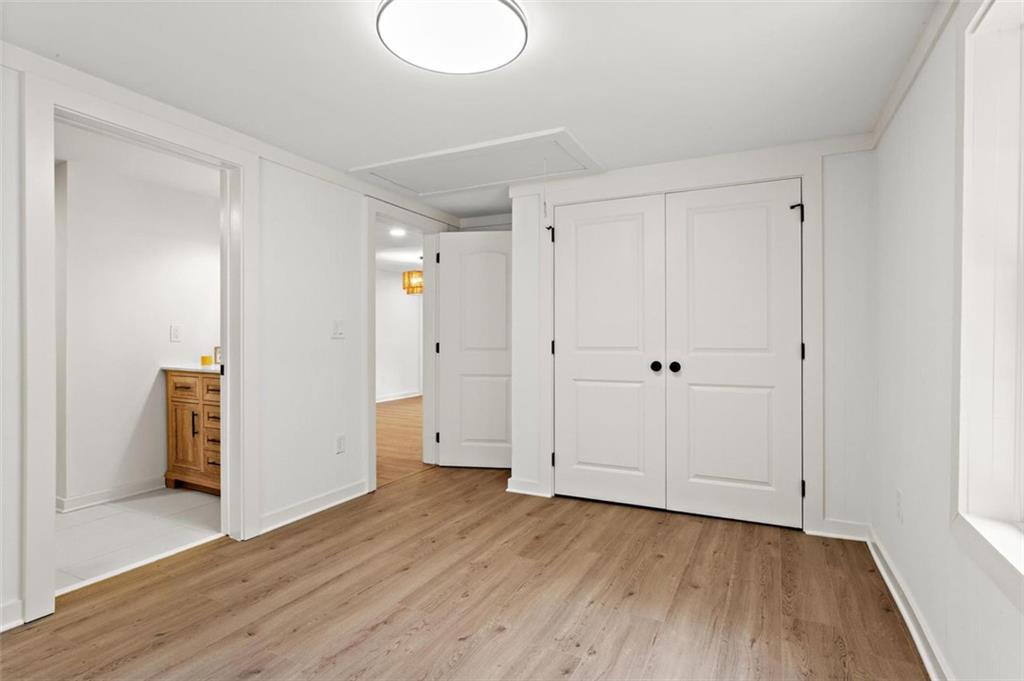 505 Cedar Creek Road Cartersville, GA 30121 - Photo 20 of 32 a view of an empty room and wooden floor
