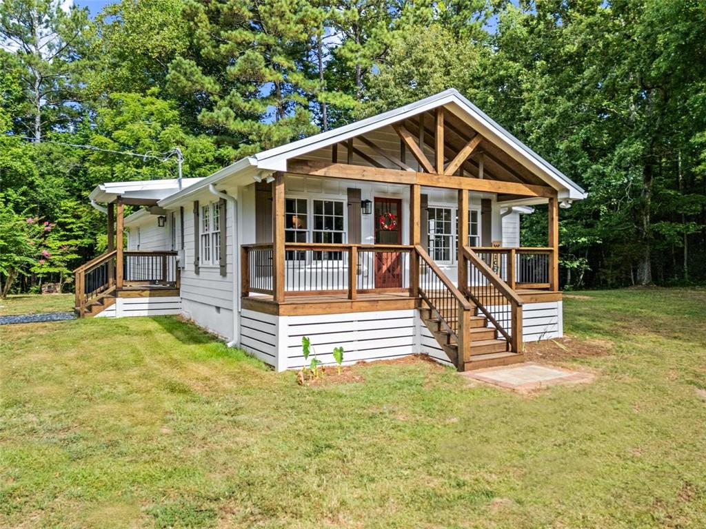 505 Cedar Creek Road Cartersville, GA 30121 - Photo 2 of 32 a front view of a house with a yard
