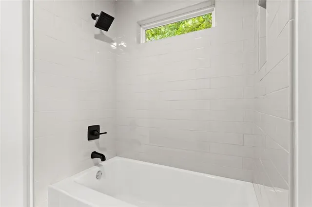 a bathroom with a bathtub