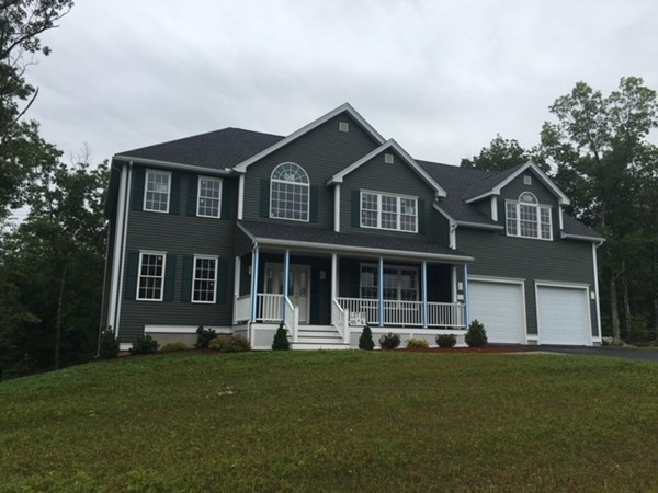 Lot 30 Mockingbird Hill Road Groton, MA 01450 - Photo 1 of 8 a front view of a house with a yard