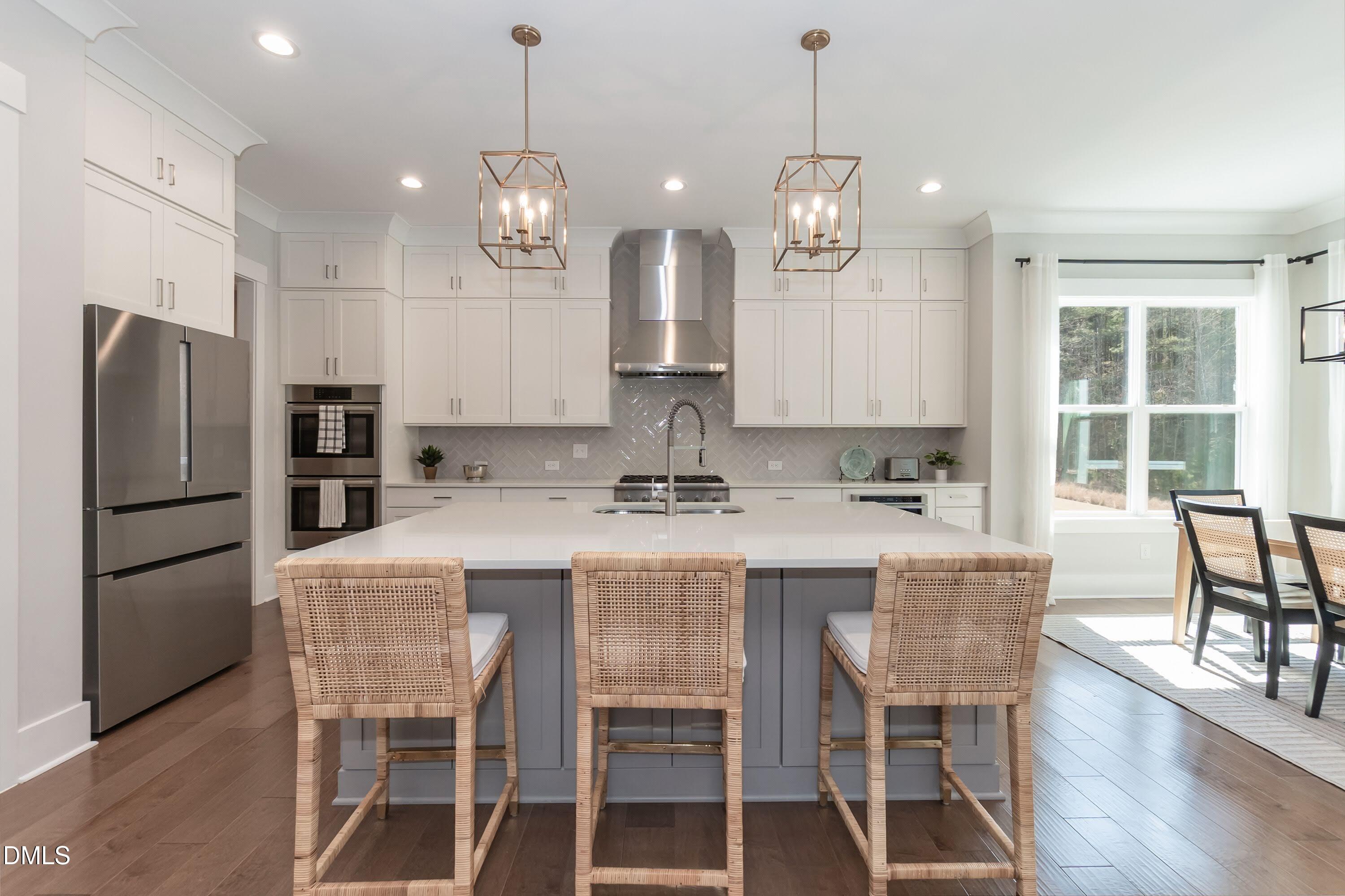 441 Bertram Valley Road Apex, NC 27523 - Photo 18 of 77 Open and easily flowing into both breakfast area and family room