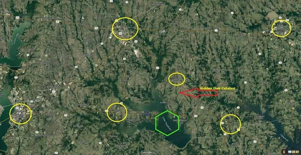 a aerial view of a house with swings and yard