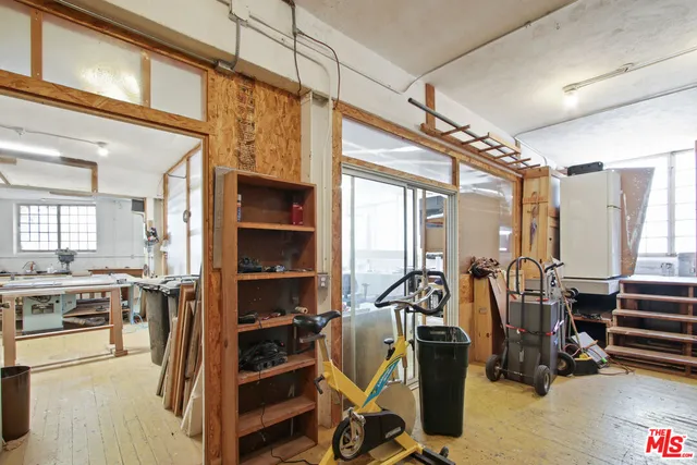 an aerial view of a building with a ocean view