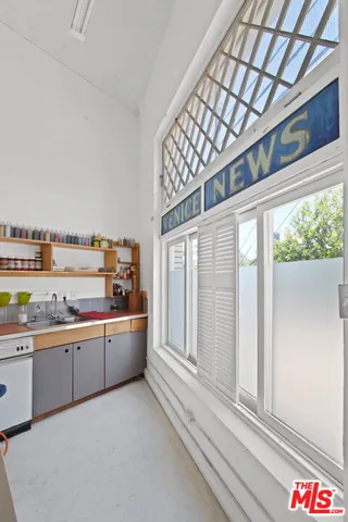 a view of a livingroom with furniture and window