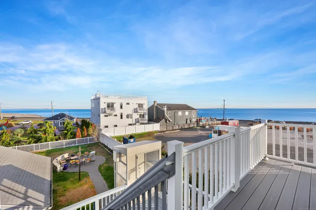 a view of a balcony with an outdoor space