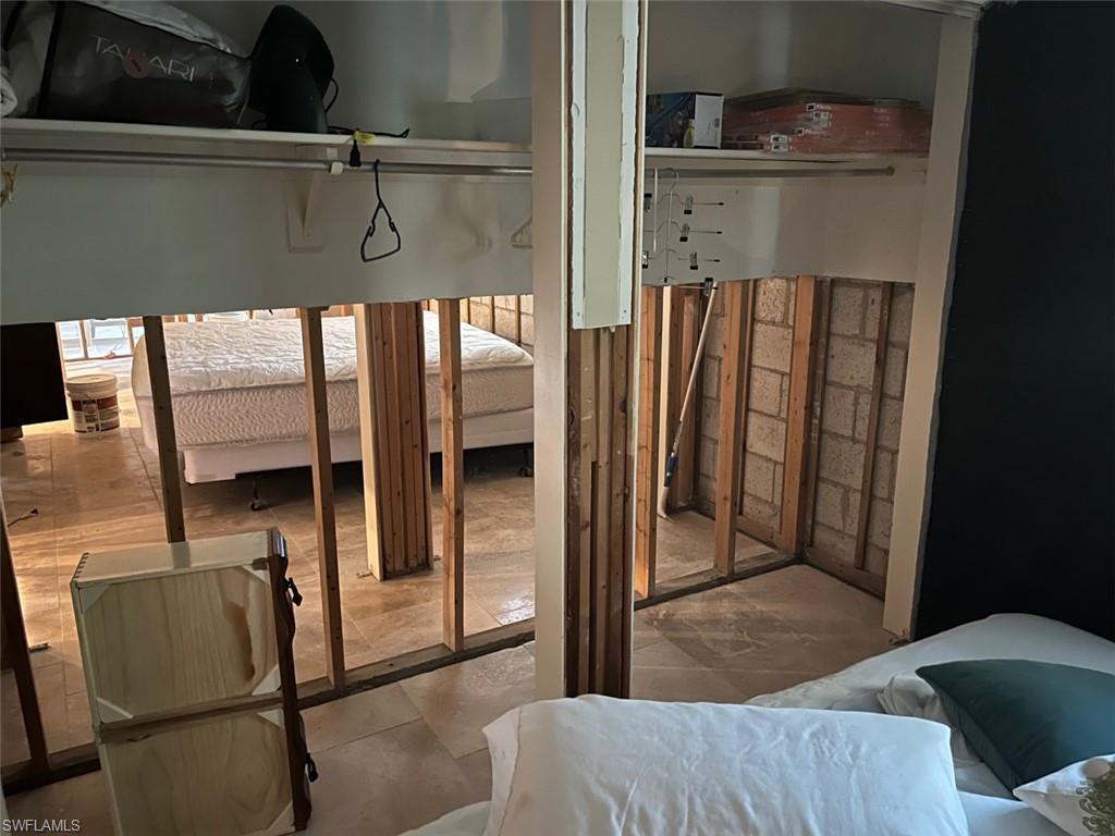 718 Old Trail Drive Naples, FL 34103 - Photo 15 of 18 a view of entryway and hall with wooden floor