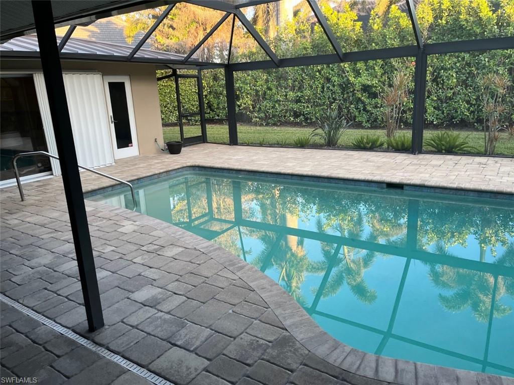 718 Old Trail Drive Naples, FL 34103 - Photo 2 of 18 a view of lake from a balcony
