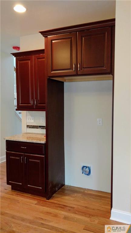 2030 Oak Tree Road Edison, NJ 08820 - Photo 8 of 33 a kitchen with granite countertop wooden cabinets