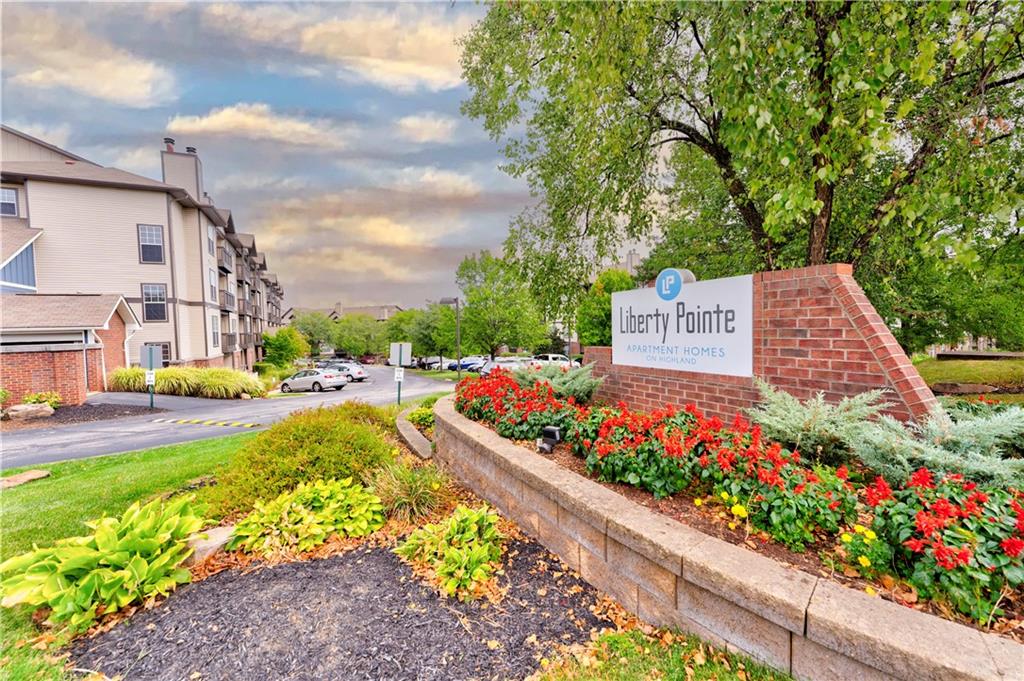 a view of a swimming pool with an outdoor seating