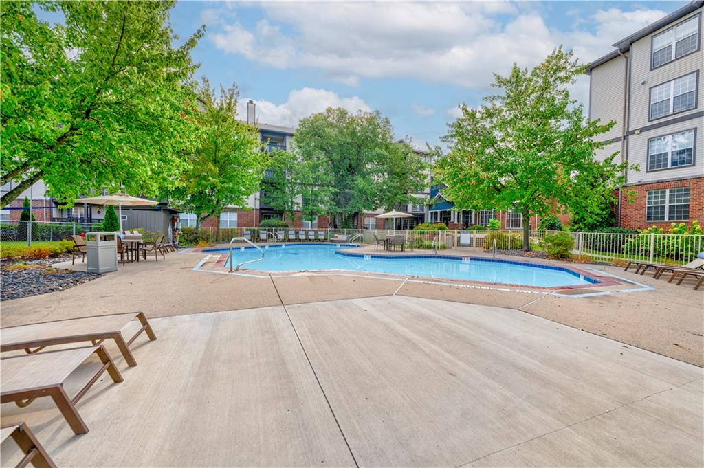 35 Highland Road Bethel Park, PA 15102 - Photo 15 of 49 a view of a swimming pool with a patio