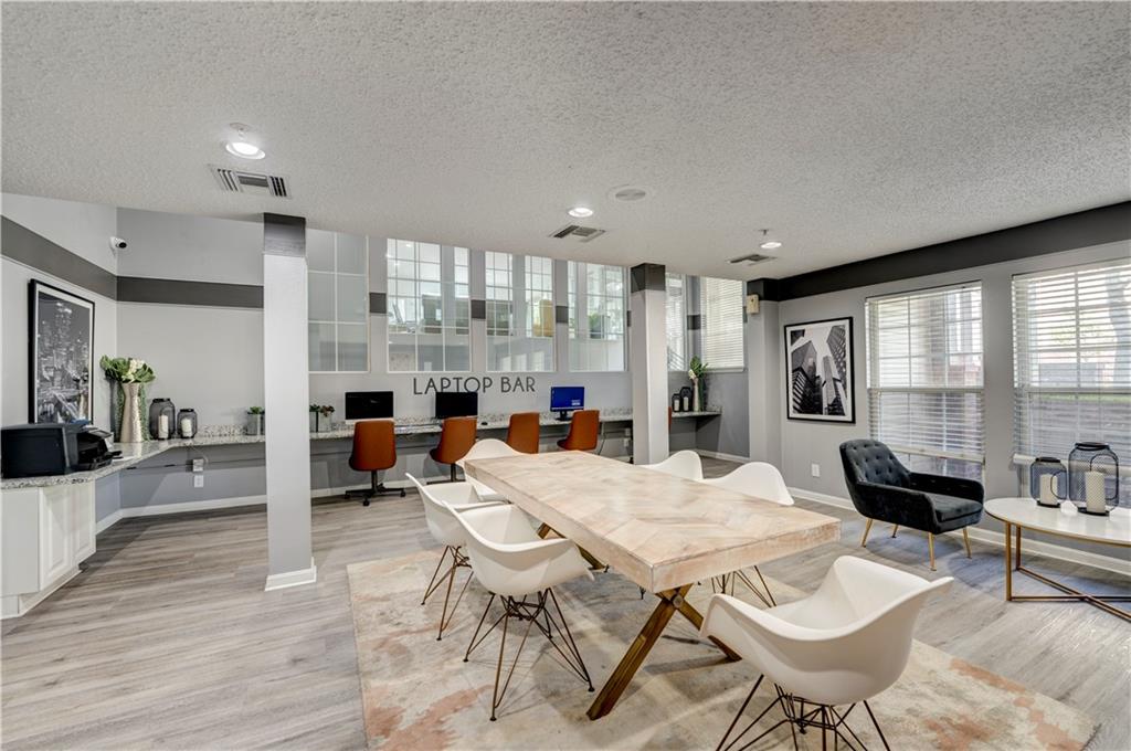 35 Highland Road Bethel Park, PA 15102 - Photo 29 of 49 a living room with furniture a table and chairs