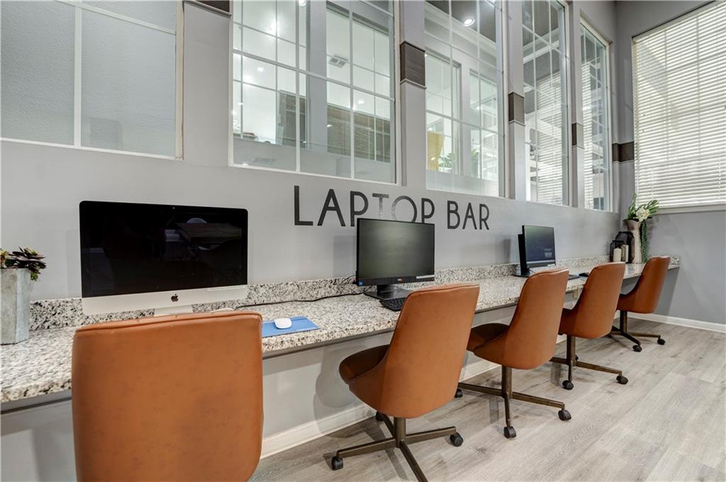 35 Highland Road Bethel Park, PA 15102 - Photo 30 of 49 a workspace with furniture and a flat screen tv