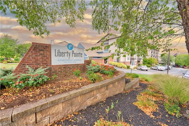 a view of a pathway with a park