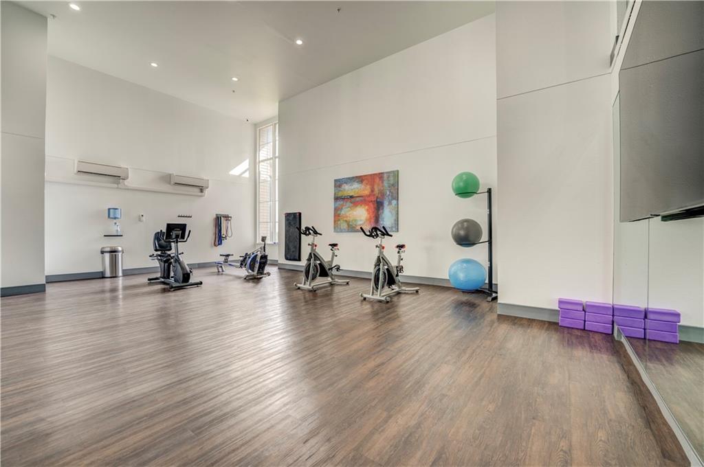 35 Highland Road Bethel Park, PA 15102 - Photo 32 of 49 a view of a room with gym equipment and wooden floor