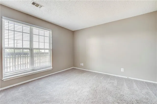 an empty room with closet