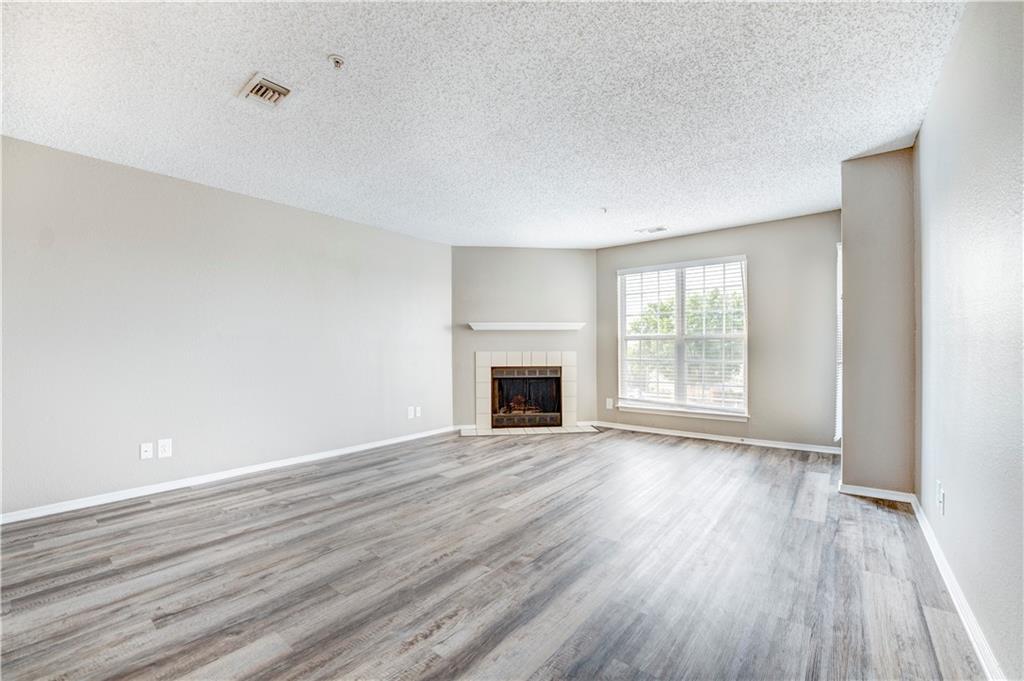 35 Highland Road Bethel Park, PA 15102 - Photo 39 of 49 a view of an empty room with wooden floor and a window