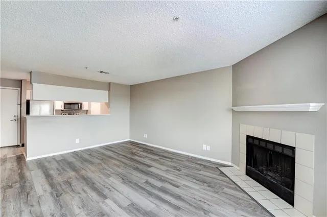 a bathroom with a toilet mirror and vanity