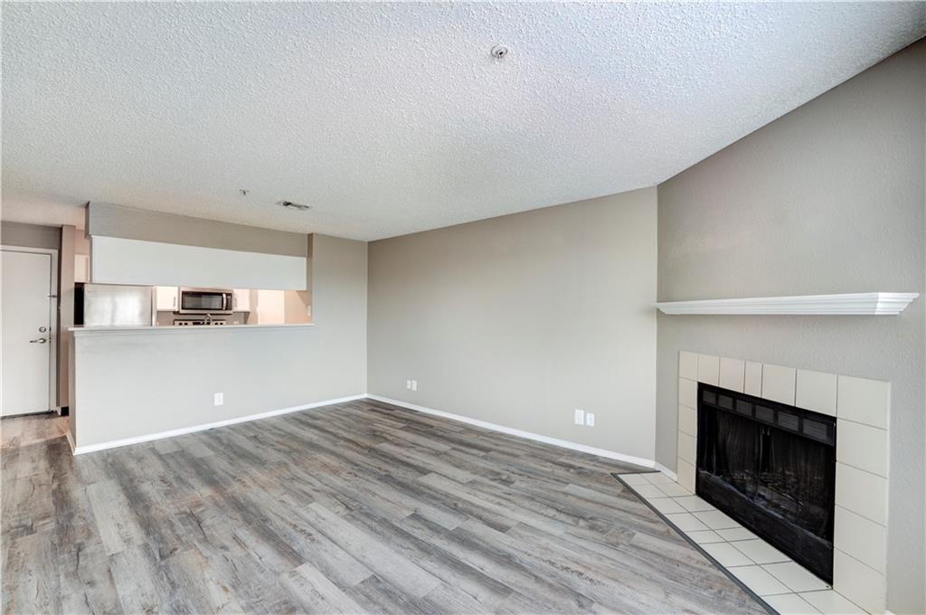 35 Highland Road Bethel Park, PA 15102 - Photo 41 of 49 a view of empty room with wooden floor and fireplace