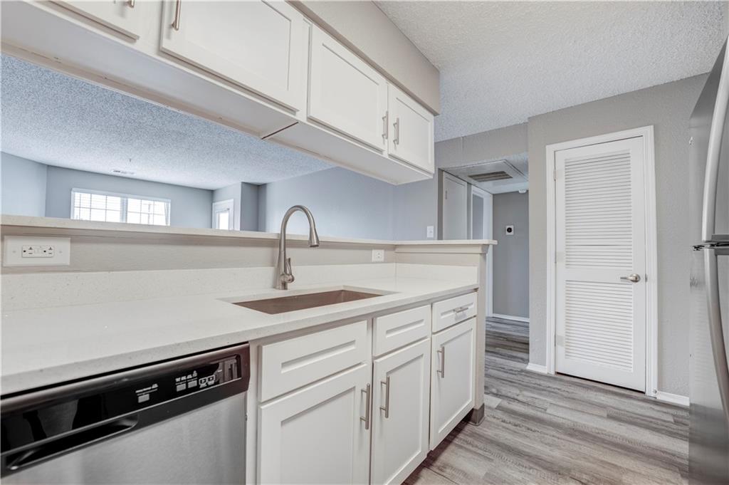 35 Highland Road Bethel Park, PA 15102 - Photo 45 of 49 a kitchen with a sink cabinets and stainless steel appliances