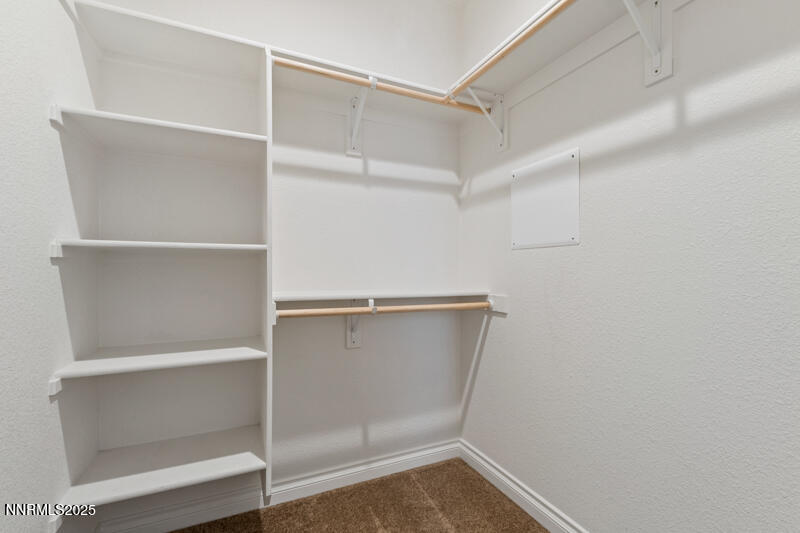 18697 Ginny Crk Court Reno, NV 89508 - Photo 13 of 23 a view of an empty walk in closet