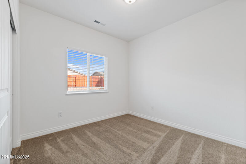 18697 Ginny Crk Court Reno, NV 89508 - Photo 16 of 23 an empty room with a window