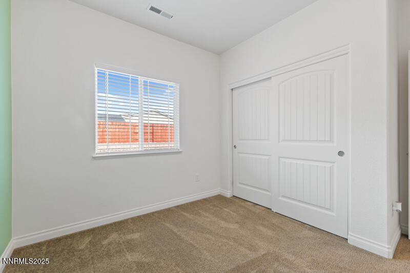 18697 Ginny Crk Court Reno, NV 89508 - Photo 19 of 23 a view of an empty room with a window