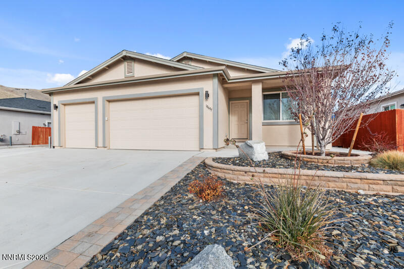 18697 Ginny Crk Court Reno, NV 89508 - Photo 2 of 23 a front view of a house with garden
