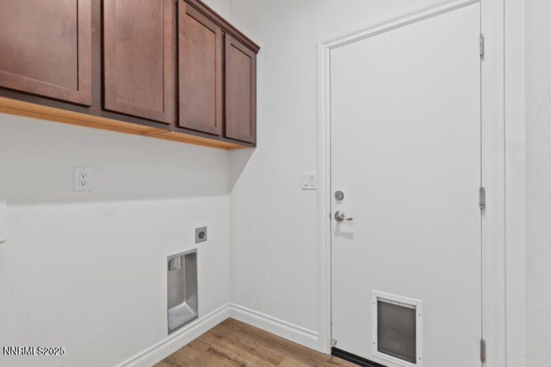 18697 Ginny Crk Court Reno, NV 89508 - Photo 10 of 23 a view of storage and utility room with wooden floor