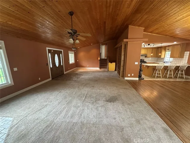 a kitchen with stainless steel appliances granite countertop a sink and a stove