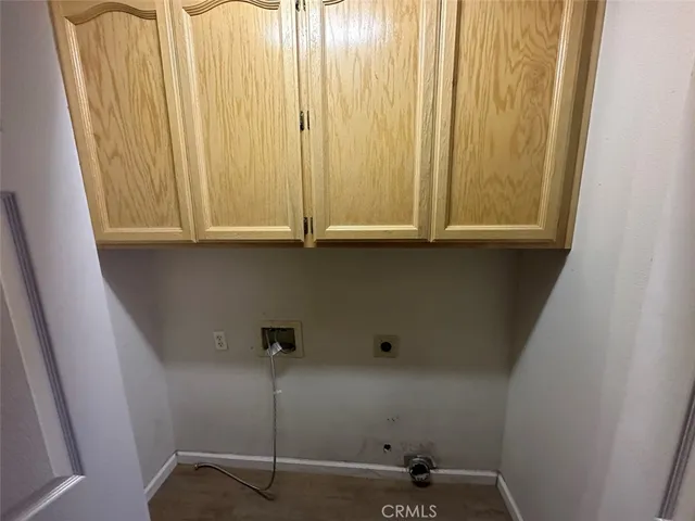 a view of a small house with a tub