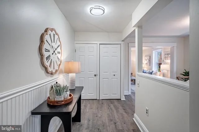 a workspace with furniture and a potted plant